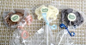 milk, white and dark Dolle's® Chocolate Crab Lollipops
