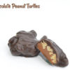 2 Dark Chocolate Peanut Turtles with one cut in half
