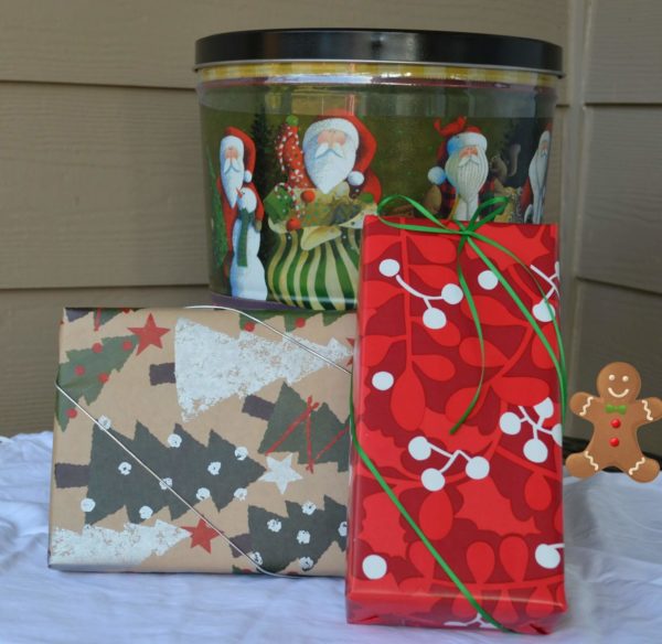 holiday decorated tin and fesitve wrapped boxes