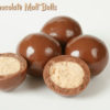 group of 5 Milk Chocolate Malt Balls with 2 spilt open
