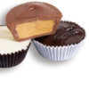 3 large peanut buter cups with milk, dark, and white chocolate shells