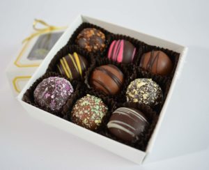open box of 9 piece Gourmet Truffles
